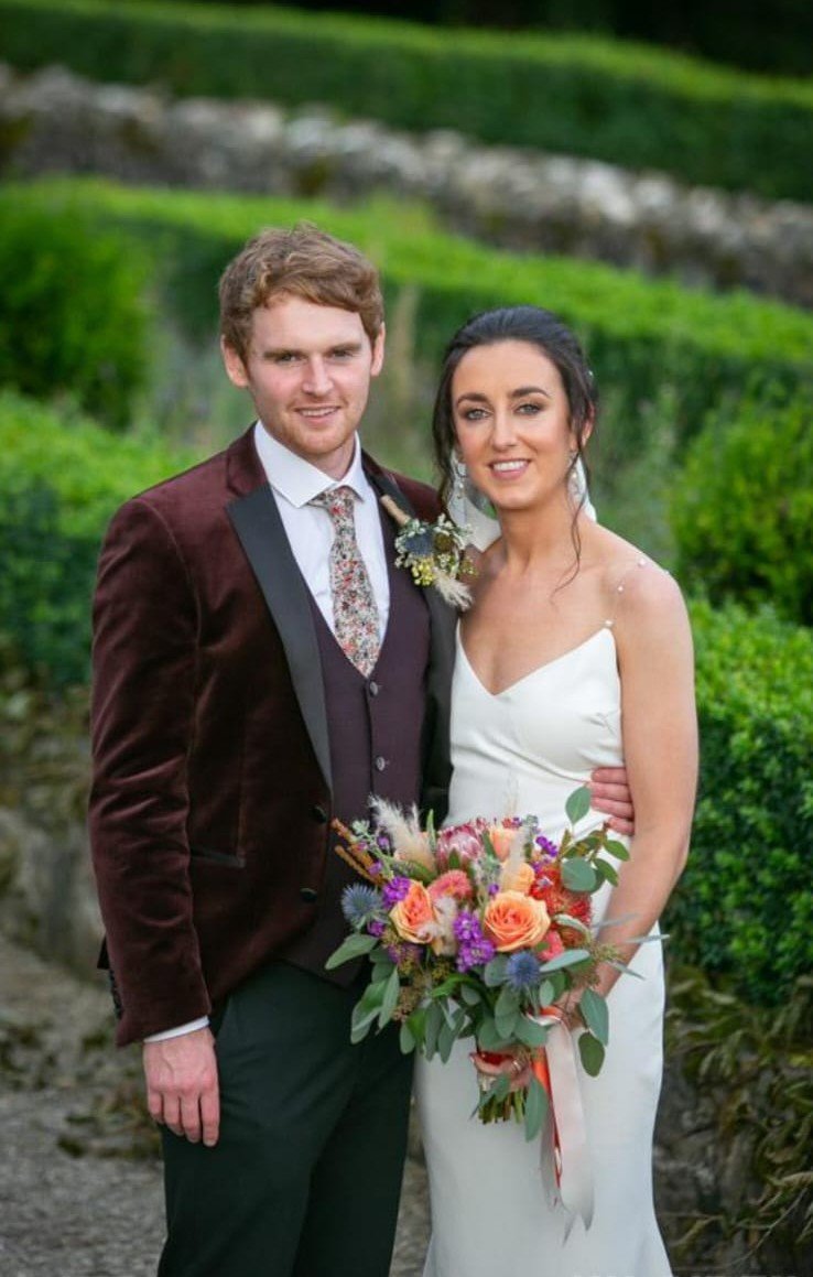 Bride and groom wedding floral arrangement
